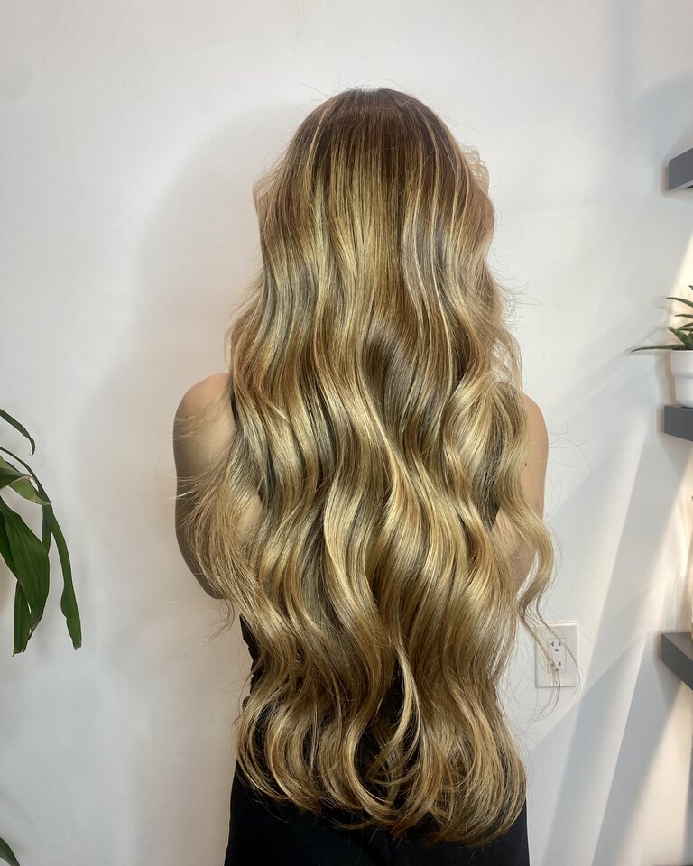 Dimensional hand-painted color showing soft root-to-end gradient